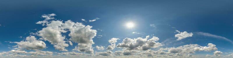 360 hdri panorama of blue skydome with cumulus clouds, seamless sky panorama view with zenith for use in 3d graphics or game development or edit drone shot photo