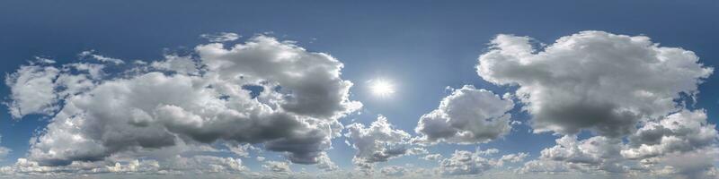 blue sky with beautiful cumulus clouds, seamless hdri 360 panorama view with zenith for use in 3d graphics or game development as sky dome or edit drone shot photo