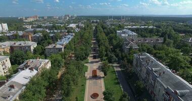 Aerial summer townscape with tree-lined walkway and residential area, Russia video