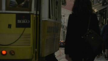 Retro tram 28 making its way in Lisbon, Portugal video