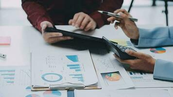 Team of business people working together in the meeting room office, teamwork background charts and graphs banner, double exposure successful teamwork,business planning concept. video