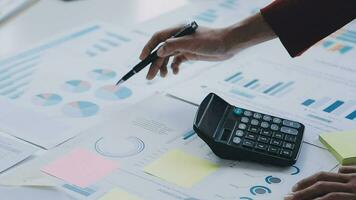Team of business people working together in the meeting room office, teamwork background charts and graphs banner, double exposure successful teamwork,business planning concept. video