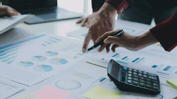 Team of business people working together in the meeting room office, teamwork background charts and graphs banner, double exposure successful teamwork,business planning concept. video