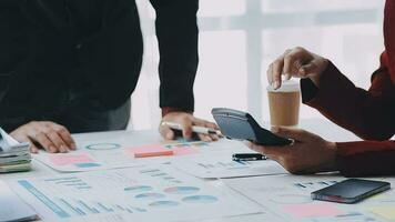Team of business people working together in the meeting room office, teamwork background charts and graphs banner, double exposure successful teamwork,business planning concept. video