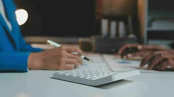 Audit concept,Administrator business man financial inspector and secretary making report calculating balance. Internal Revenue Service checking document. video
