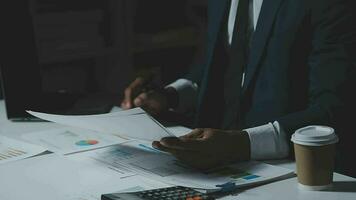 Audit concept,Administrator business man financial inspector and secretary making report calculating balance. Internal Revenue Service checking document. video