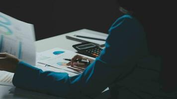 Audit concept,Administrator business man financial inspector and secretary making report calculating balance. Internal Revenue Service checking document. video