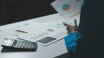 Audit concept,Administrator business man financial inspector and secretary making report calculating balance. Internal Revenue Service checking document. video
