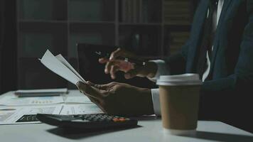 Audit concept,Administrator business man financial inspector and secretary making report calculating balance. Internal Revenue Service checking document. video