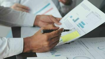 Close up of Business team analyzing income charts and graphs with modern laptop computer. Business analysis and strategy concept. video