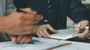 Close up of Business team analyzing income charts and graphs with modern laptop computer. Business analysis and strategy concept. video