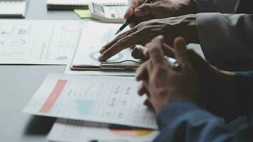 Close up of Business team analyzing income charts and graphs with modern laptop computer. Business analysis and strategy concept. video