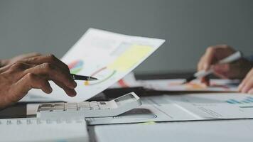 Close up of Business team analyzing income charts and graphs with modern laptop computer. Business analysis and strategy concept. video