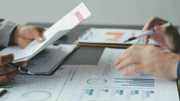 Close up of Business team analyzing income charts and graphs with modern laptop computer. Business analysis and strategy concept. video