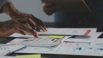 Close up of Business team analyzing income charts and graphs with modern laptop computer. Business analysis and strategy concept. video
