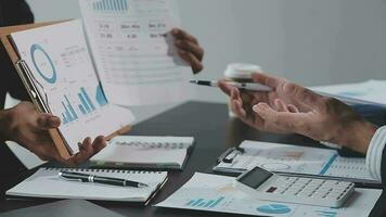 Close up of Business team analyzing income charts and graphs with modern laptop computer. Business analysis and strategy concept. video