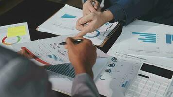Close up of Business team analyzing income charts and graphs with modern laptop computer. Business analysis and strategy concept. video