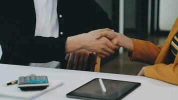 Team of business people working together in the meeting room office, teamwork background charts and graphs banner, double exposure successful teamwork,business planning concept. video