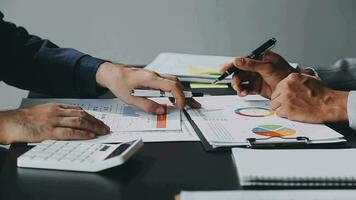 Team of business people working together in the meeting room office, teamwork background charts and graphs banner, double exposure successful teamwork,business planning concept. video