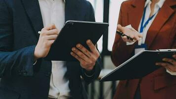 Team of business people working together in the meeting room office, teamwork background charts and graphs banner, double exposure successful teamwork,business planning concept. video