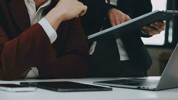 Team of business people working together in the meeting room office, teamwork background charts and graphs banner, double exposure successful teamwork,business planning concept. video