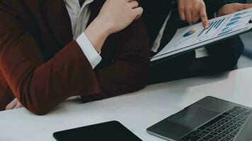 Team of business people working together in the meeting room office, teamwork background charts and graphs banner, double exposure successful teamwork,business planning concept. video