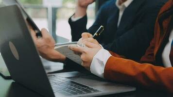 Team of business people working together in the meeting room office, teamwork background charts and graphs banner, double exposure successful teamwork,business planning concept. video