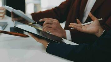 Team of business people working together in the meeting room office, teamwork background charts and graphs banner, double exposure successful teamwork,business planning concept. video
