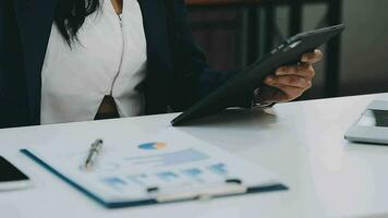 Team of business people working together in the meeting room office, teamwork background charts and graphs banner, double exposure successful teamwork,business planning concept. video