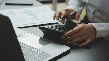 Financial Businesswomen analyze the graph of the company's performance to create profits and growth, Market research reports and income statistics, Financial and Accounting concept. video