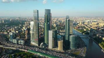 Aerial Moscow cityscape with business centre, river and heavy traffic video