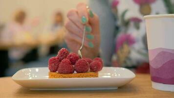 Eating dessert with raspberries video