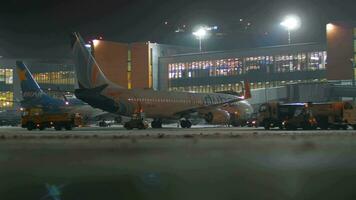 Airplanes parked at Terminal D of Sheremetyevo Airport, night view video