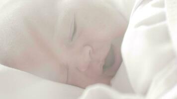 Newborn baby yawning and falling asleep video