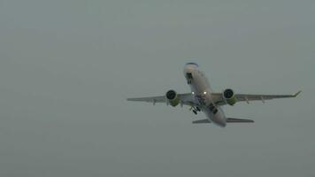 Aircraft of airBaltic taking off and ascending in the sky video