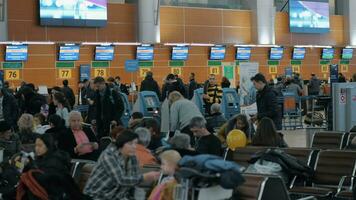 Registration desks and lounge with people in Terminal D of Sheremetyevo Airport video