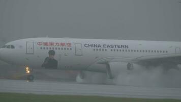 A330 of China Eastern airline on wet runway of Sheremetyevo Airport, Moscow video