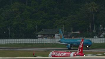 PHUKET, THAILAND NOVEMBER 30, 2019 - AirAsia Airbus A320 accelerate before departure, International Phuket Airport video