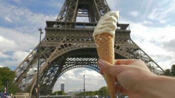 Soft serve ice cream and Eiffel Tower in Paris, France video