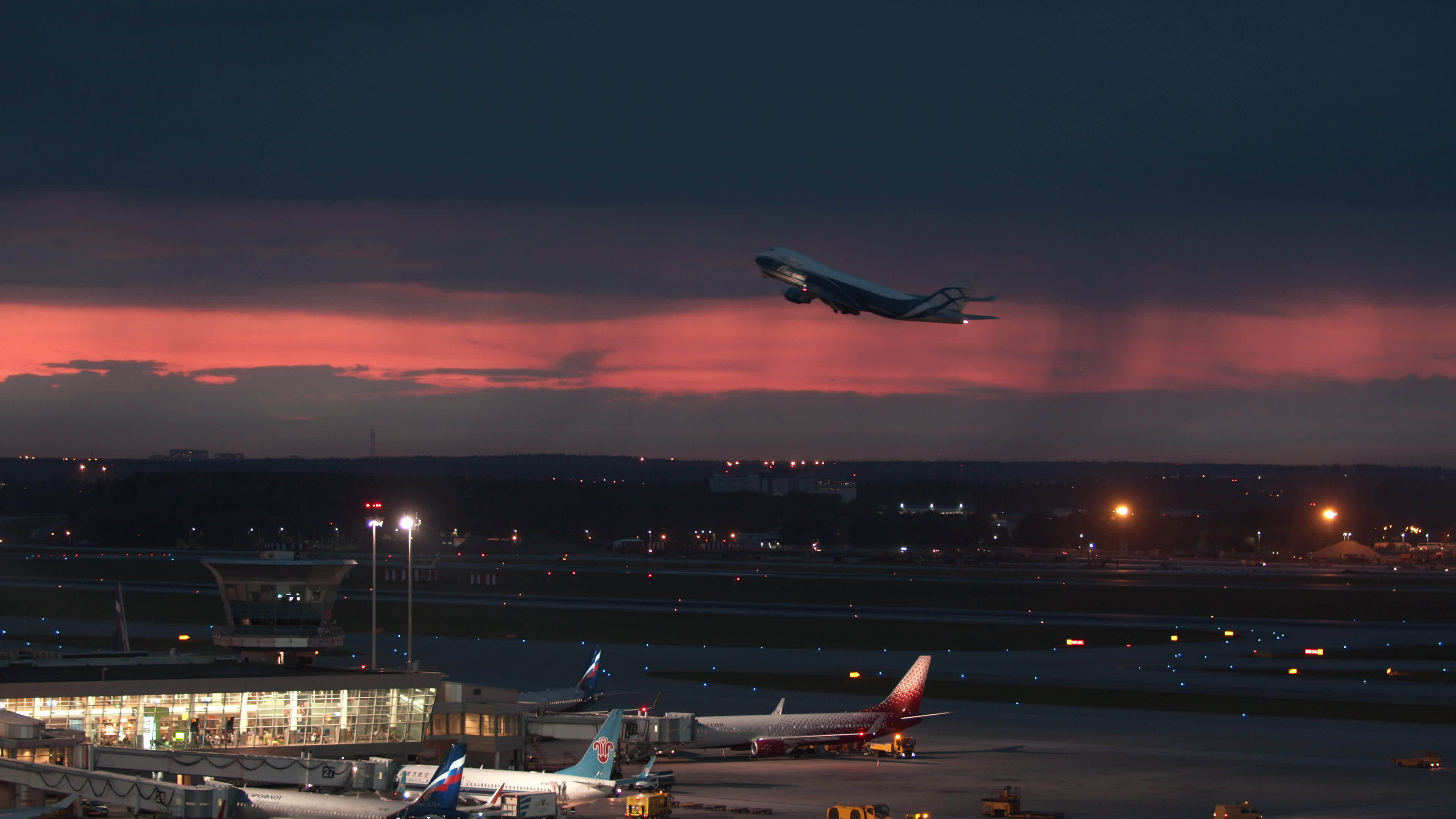 Evening view of Sheremetyevo Airport and AirBridgeCargo plane departing ...
