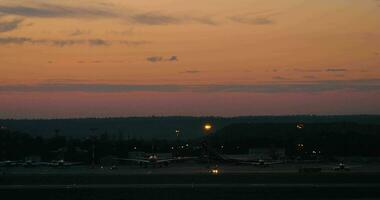 Airport with plane taking off in the dusk video