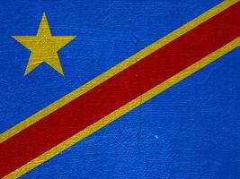 Flag of Democratic Republic of the Congo on a textured background. Concept collage. photo