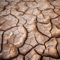 Closeup of Dry Cracked Desert Dirt Generative AI photo