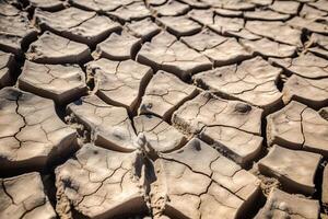 Closeup of Dry Cracked Desert Dirt Generative AI photo