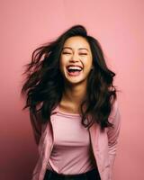 portrait of happy young asian woman laughing isolated over pink background stock photo generative AI