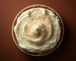 a coconut cream pie on top of a brown surface generative ai photo