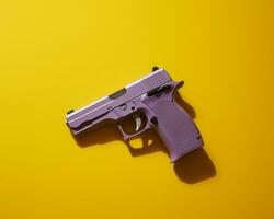 a purple gun on a yellow background generative ai photo