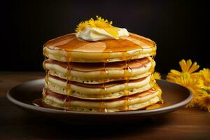 a stack of pancakes with butter and dandelions generative ai photo