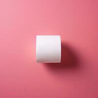 a white roll of toilet paper on a pink background generative ai photo