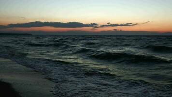 Scene of strong sea surf at sunset video